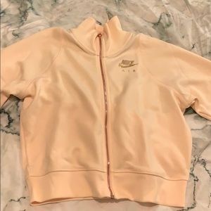 Light pink Nike Air track jacket